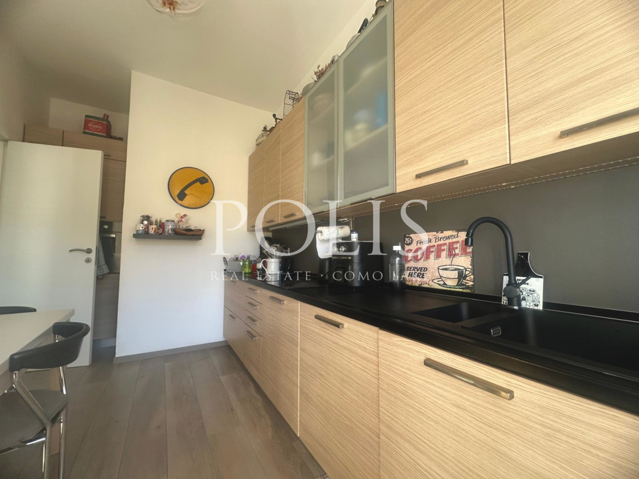 AMPIO ED ELEGANTE APPARTAMENTO QUADRILOCALE CON POSTO AUTO COPERTO