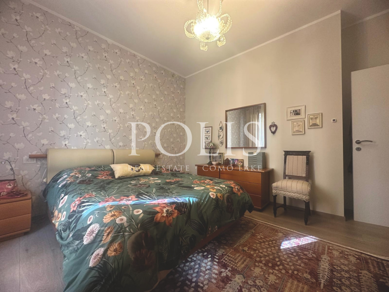 AMPIO ED ELEGANTE APPARTAMENTO QUADRILOCALE CON POSTO AUTO COPERTO