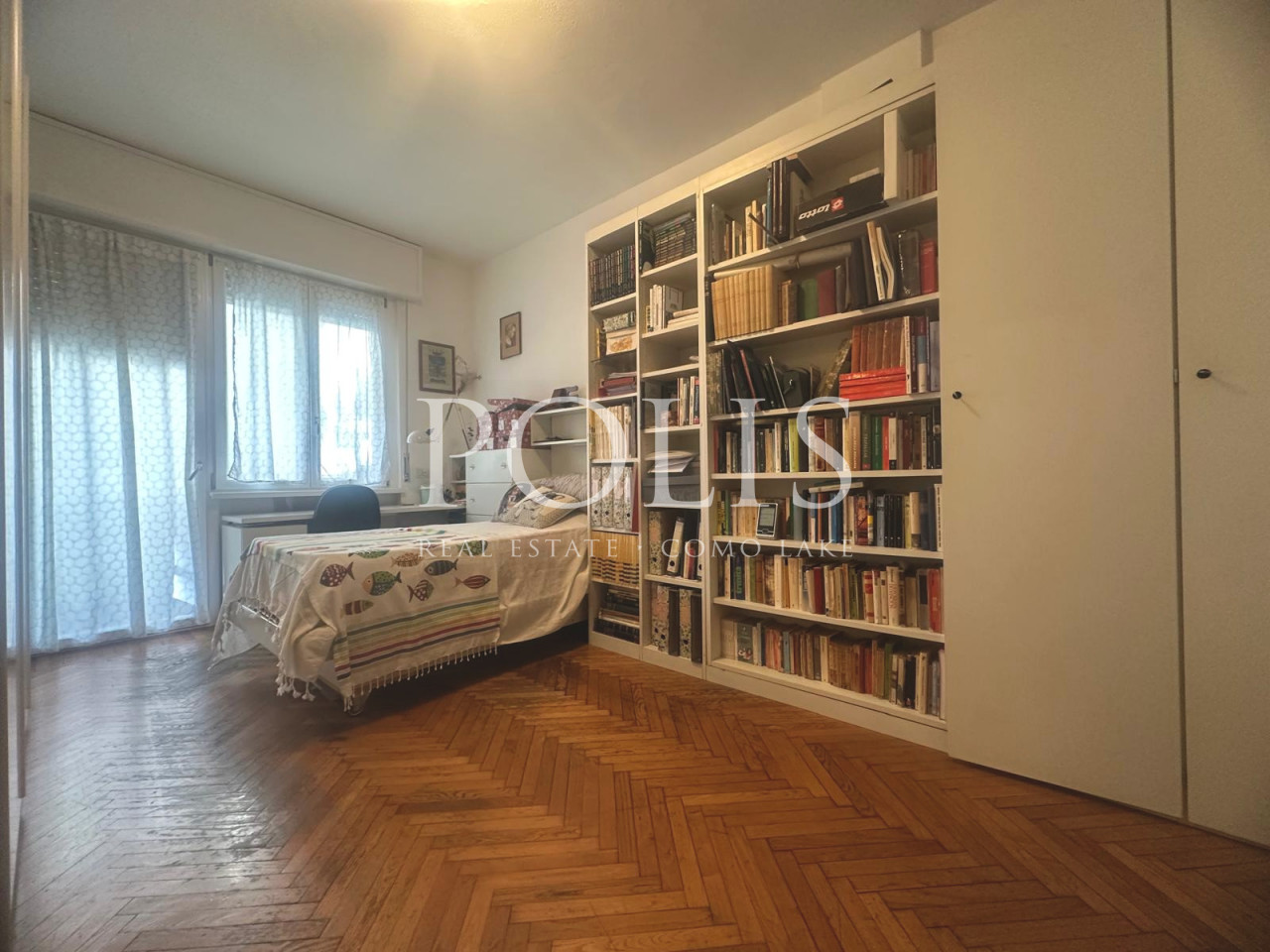 AMPIO ED ELEGANTE APPARTAMENTO QUADRILOCALE CON POSTO AUTO COPERTO