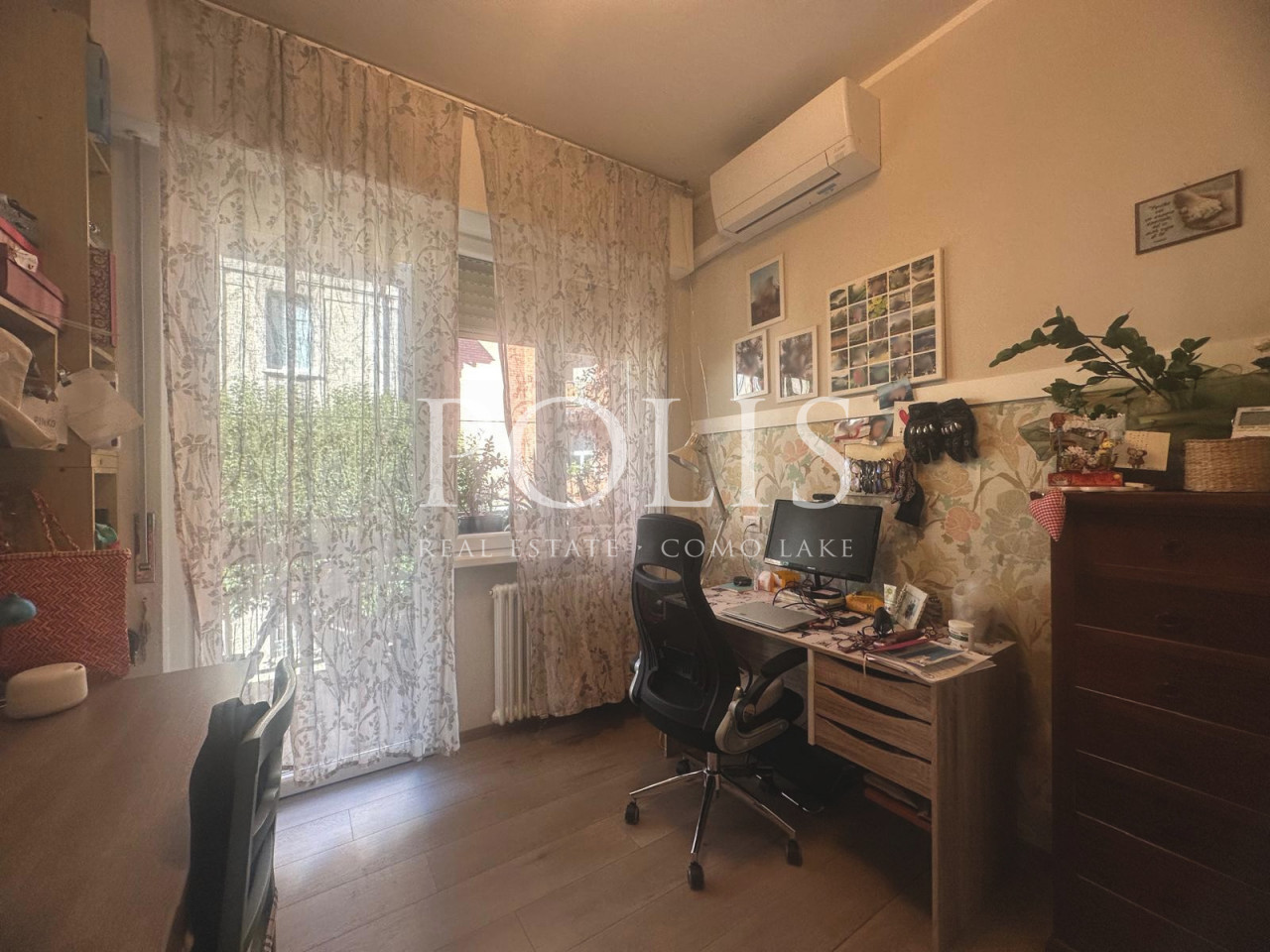 AMPIO ED ELEGANTE APPARTAMENTO QUADRILOCALE CON POSTO AUTO COPERTO