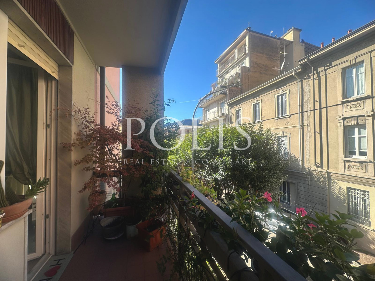 AMPIO ED ELEGANTE APPARTAMENTO QUADRILOCALE CON POSTO AUTO COPERTO