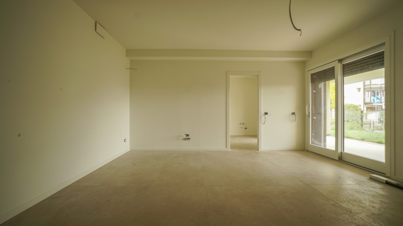 Nuovo appartamento piano terra con giardino esclusivo e garage in vendita a Verona — foto 1
