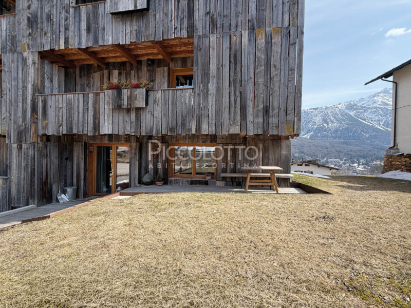Rif. V5062 - Cortina d’Ampezzo, prestigioso appartamento in vendita con splendido giardino, inser...