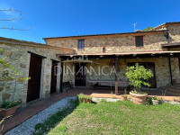 Large semi-detached farmhouse with land and olive trees in a panoramic position