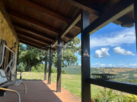 Large semi-detached farmhouse with land and olive trees in a panoramic position