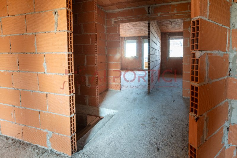 PIOVE DI SACCO - Porzione di VILLETTA di mezzo terminata esternamente e grezza all'interno con po...