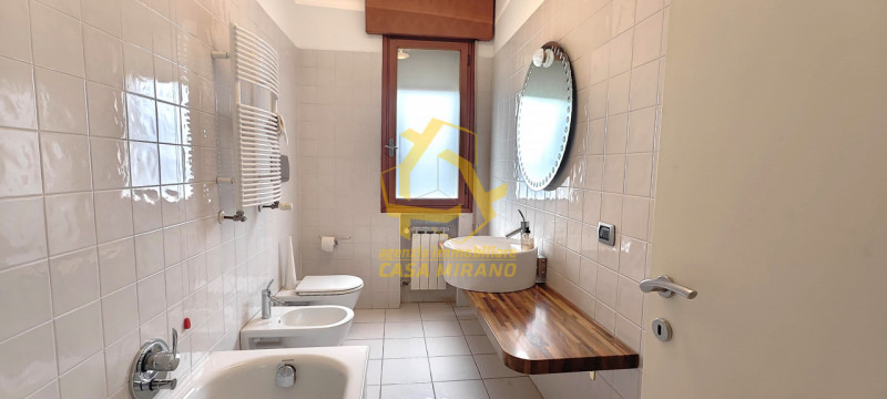 MIRANO APPARTAMENTO con TAVERNA e GIARDINETTO PRIVATO