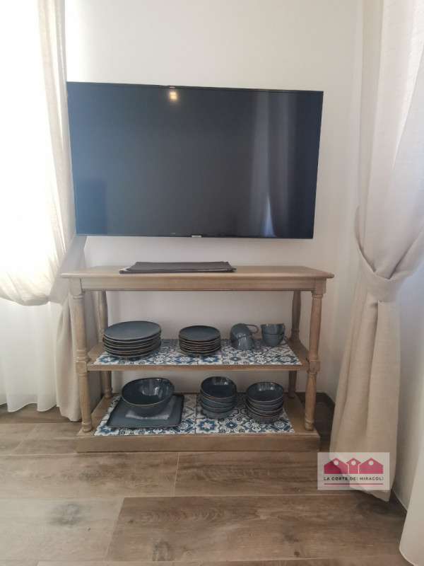 FAVIGNANA CENTRO: SPLENDIDO ATTICO TRICAMERE CON TERRAZZA PANORAMICA, COMPLETAMENTE RISTRUTTURATO...