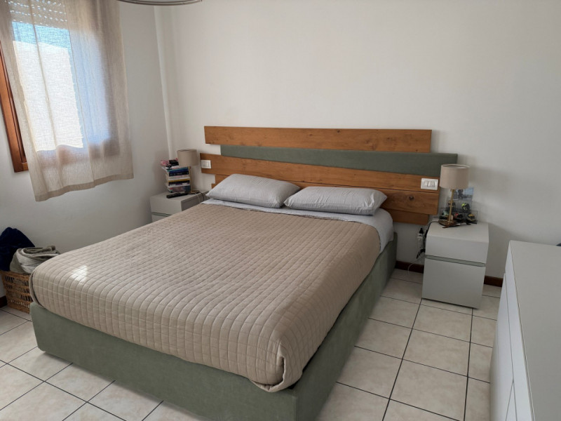 INTROVABILE BILOCALE AL PIANO TERRA CON AREA ESTERNA ESCLUSIVA, GARAGE AMPIO E POSTO AUTO SCOPERT...