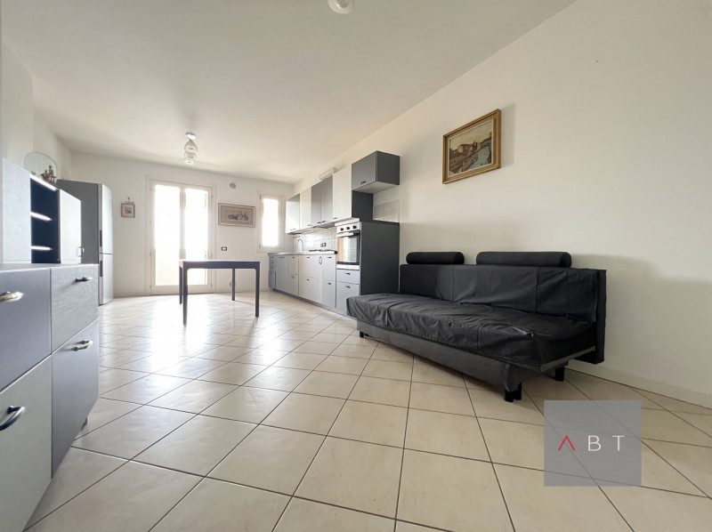 Appartamento situato al piano secondo e composto di: soggiorno con angolo cottura, due camere, du...